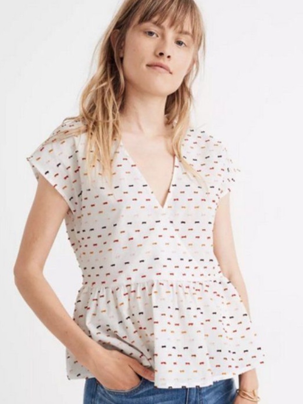 Madewell Peplum Crossover Top in Rainbow
Clipdot. Size: Large
